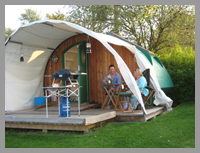 camping cabin in the orchard